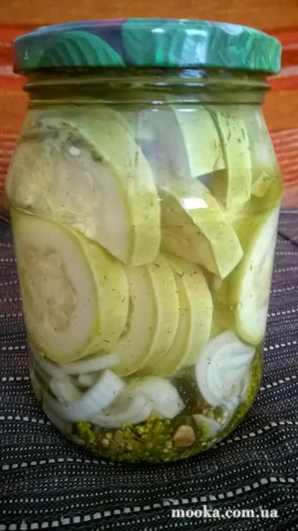Огурцы (кабачки) маринованные с луком